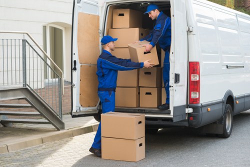 Man and van team beginning a safe moving job with equipment and planning