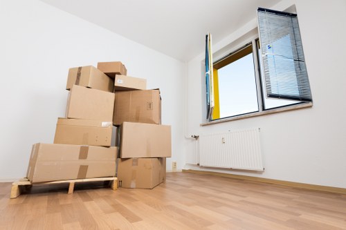 Professional movers loading household items in Bermondsey