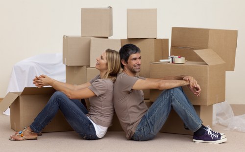 Packed household boxes ready for a local house removal service