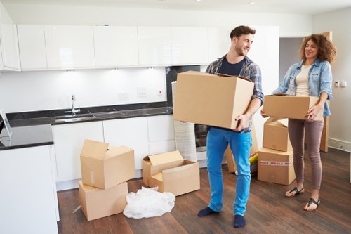 Loading furniture and boxes into a removal truck for a flat move