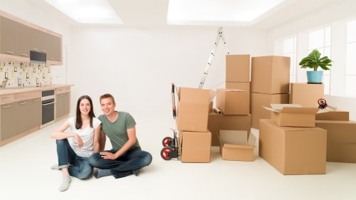 Careful unloading of boxes and furniture at a Bermondsey property