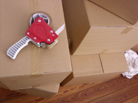 Packed boxes and furniture being prepared for a local Bermondsey removal